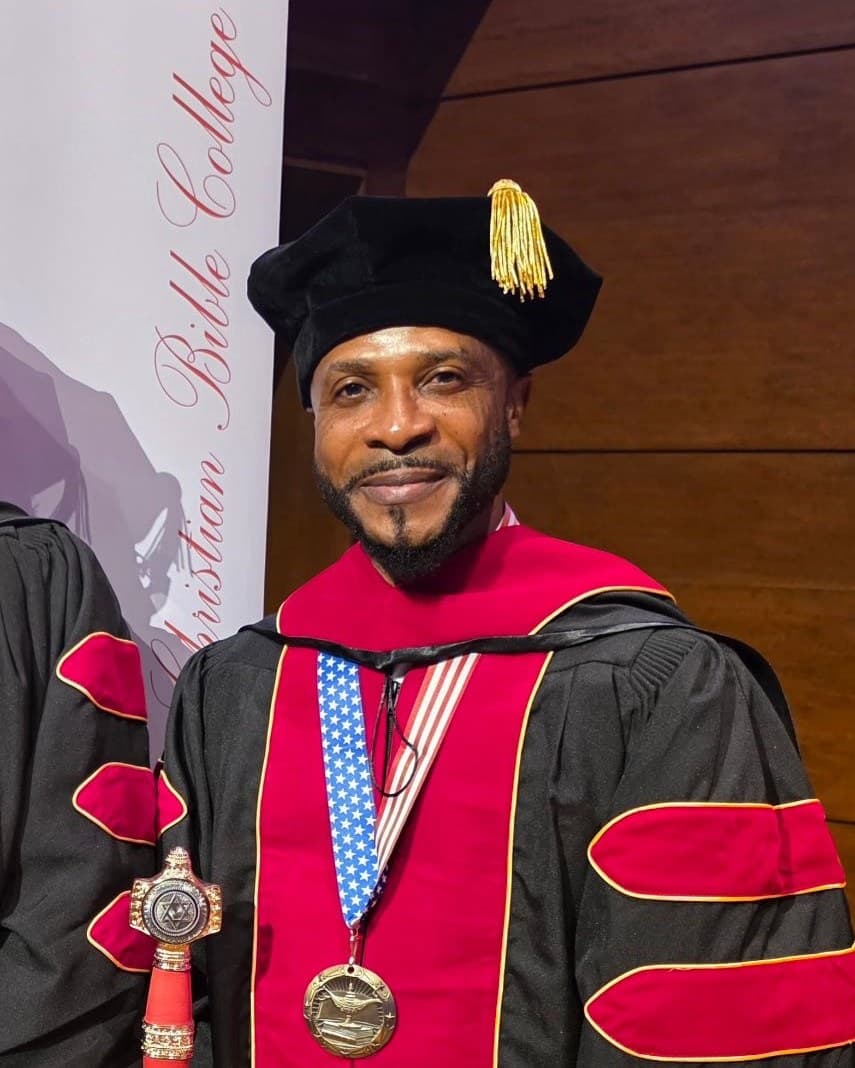 Dr. Aloysious P. Davis in doctoral robes